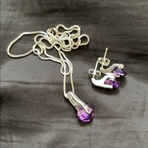 Silver necklace with purple stone